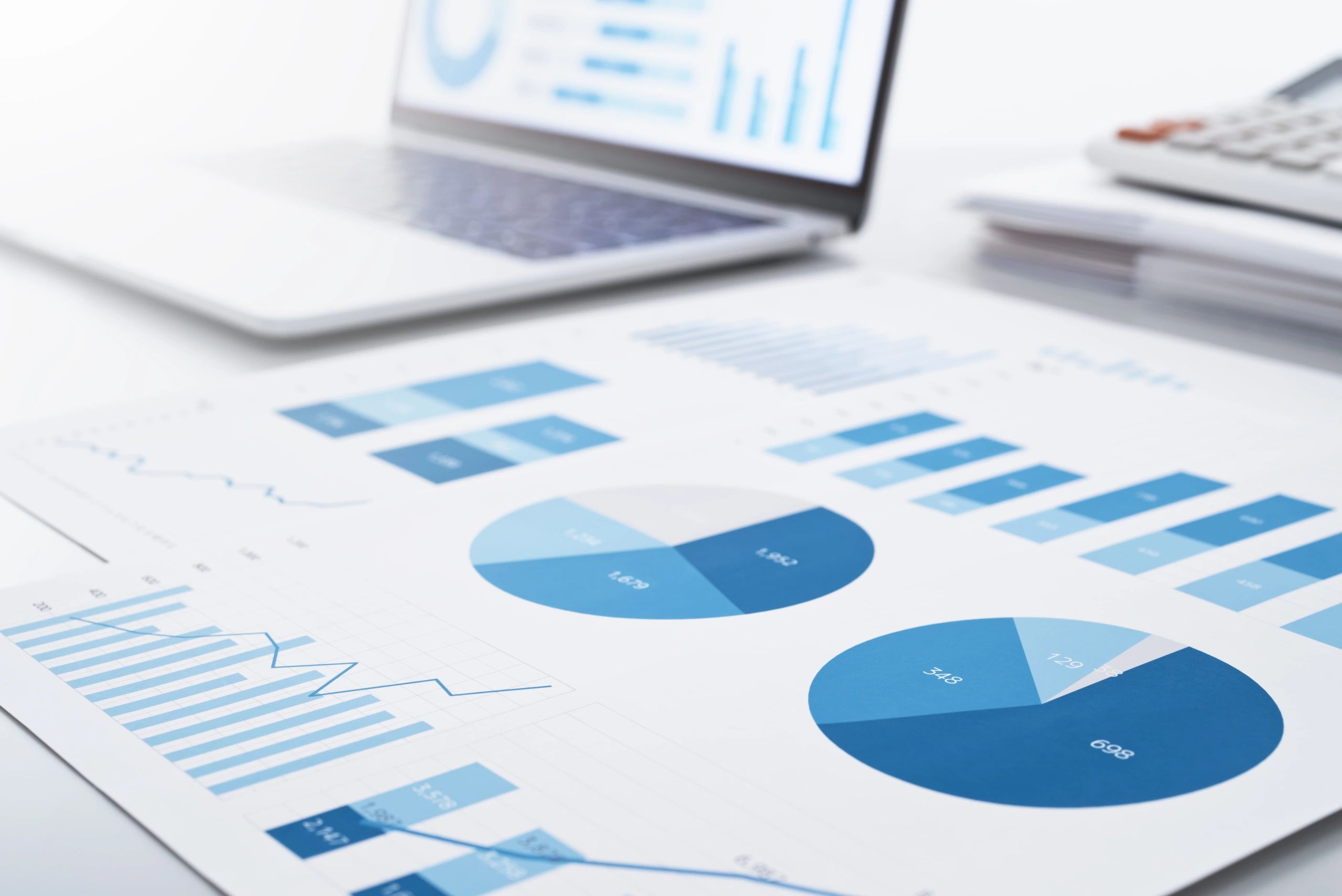 Business intelligence reports and laptop analytics dashboard