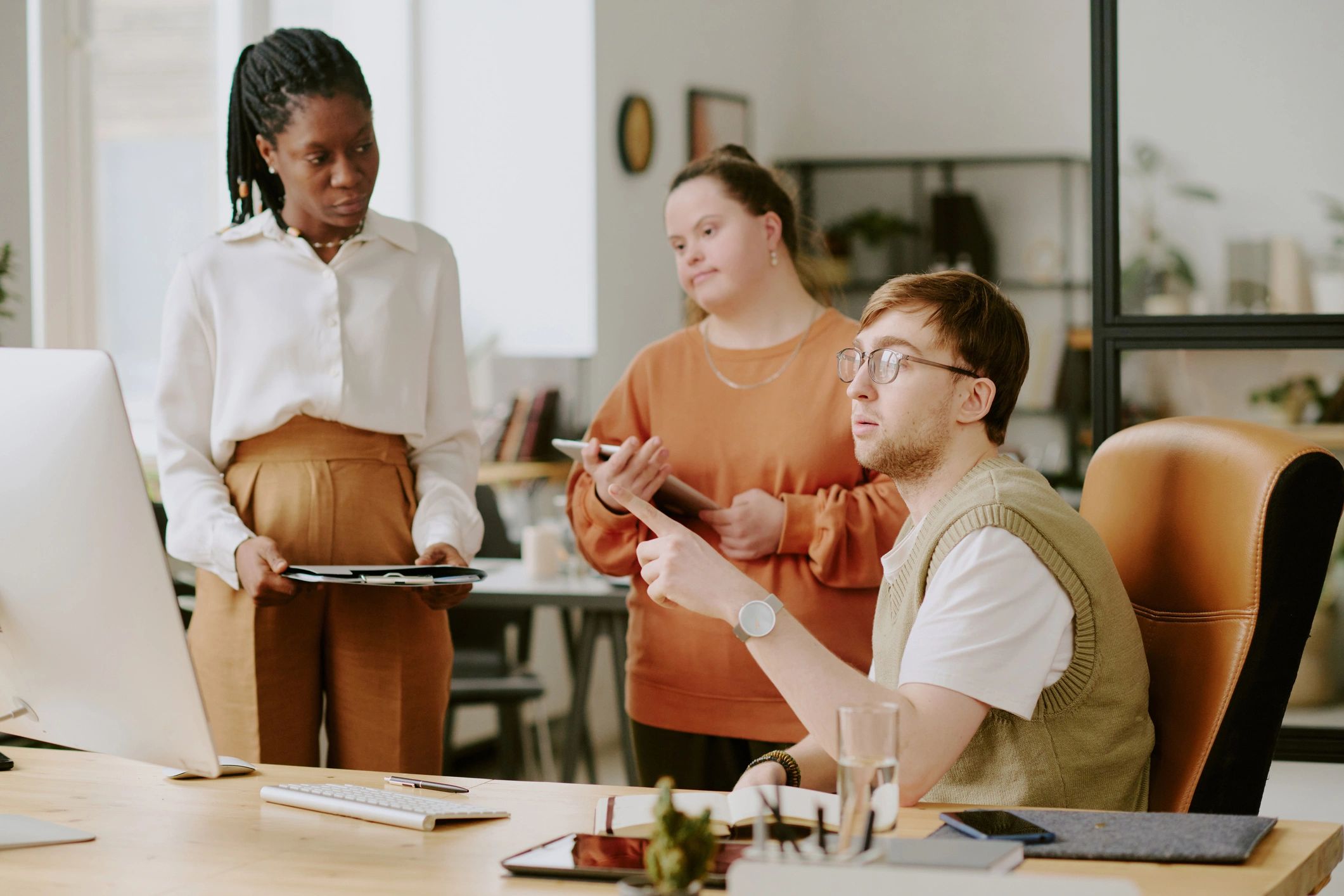 Team reviewing work plans on a computer screen
